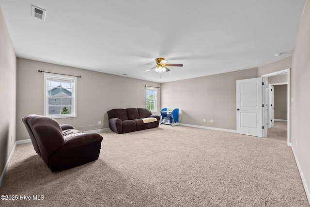 402 Kinroff Dr, Hubert, NC 28539 - living room featuring carpet flooring, ceiling fan, and baseboards