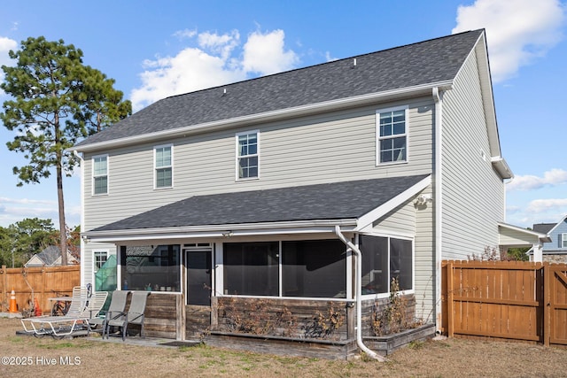 402 Kinroff Dr, Hubert, NC 28539 - rear view of property featuring a sunroom and a shingled roof