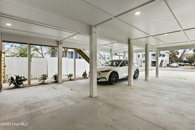 garage with a carport