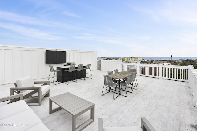 view of patio featuring an outdoor living space and a deck