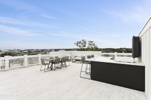 view of patio featuring an outdoor bar