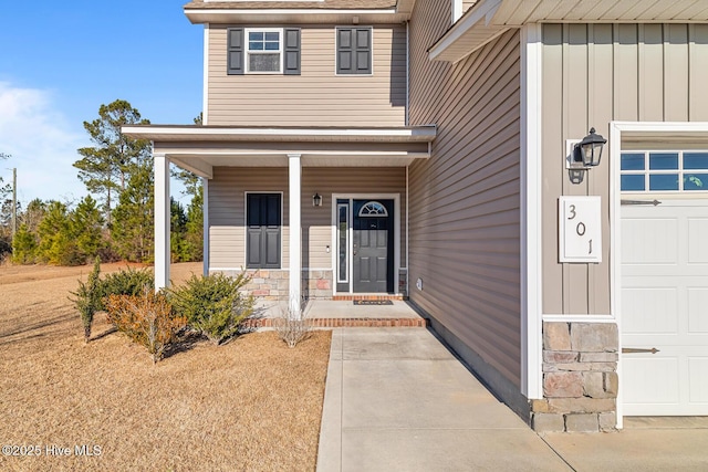 property entrance featuring covered porch