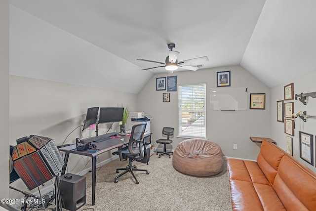 carpeted home office with ceiling fan and lofted ceiling