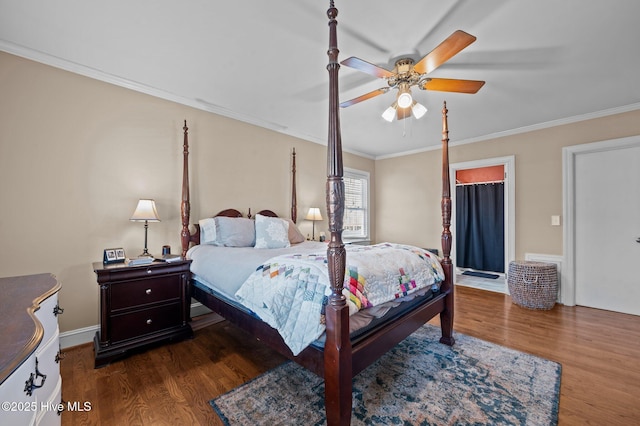 bedroom featuring ceiling fan, dark wood-type flooring, and ornamental molding