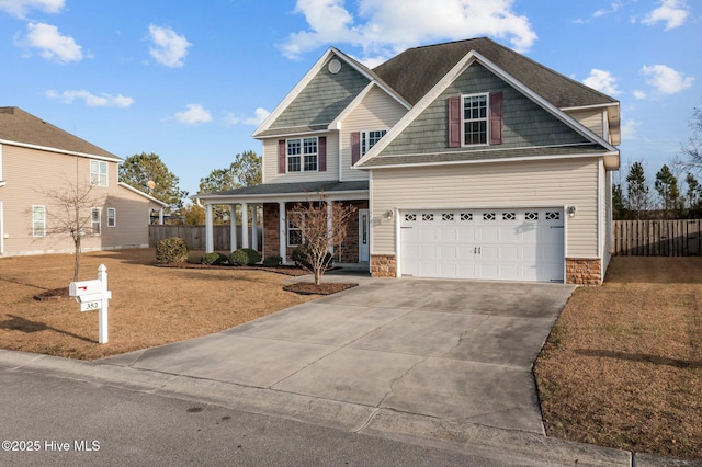 view of front of property with a garage