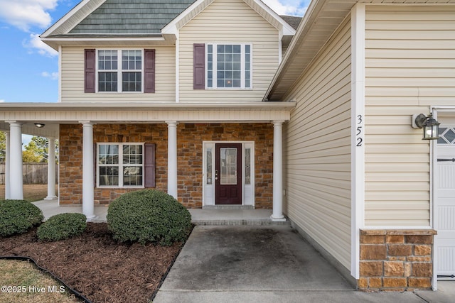 entrance to property with a porch