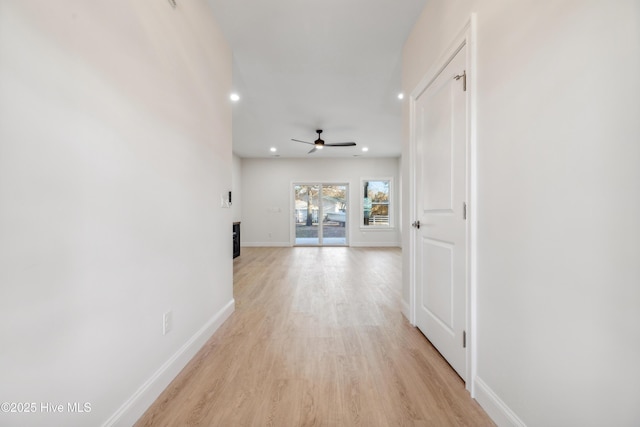 hallway featuring light wood-type flooring