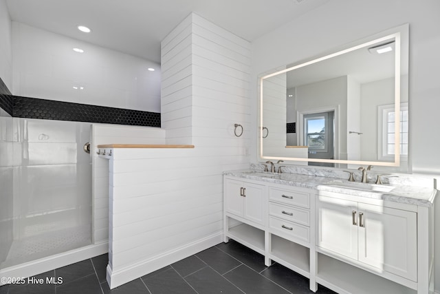 bathroom with vanity and tile patterned flooring