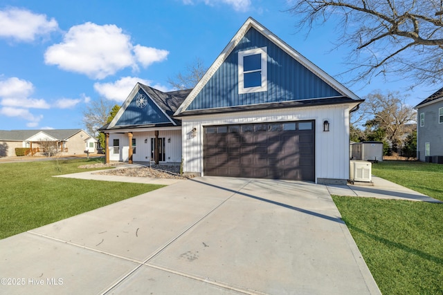 view of front of home featuring a garage and a front yard