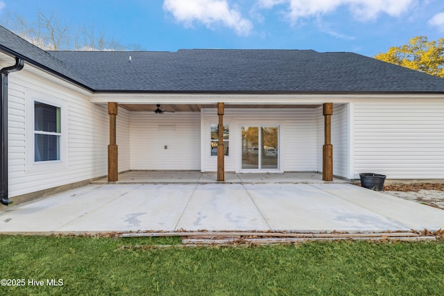 rear view of property featuring a patio area and ceiling fan