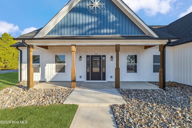 property entrance featuring covered porch