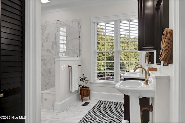 bathroom featuring ornamental molding and walk in shower