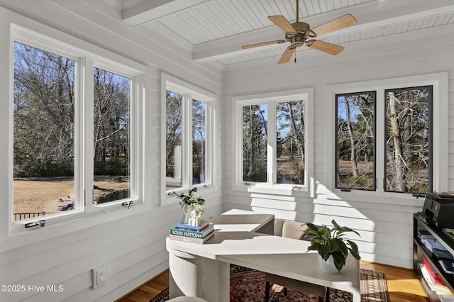 sunroom with beam ceiling