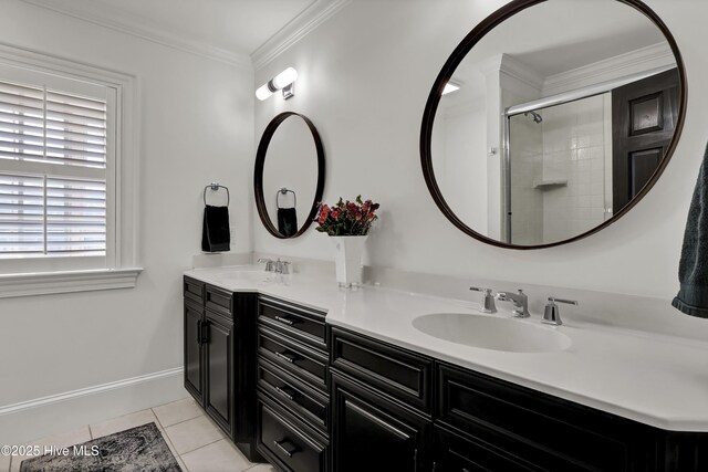 bathroom with tile patterned floors, ornamental molding, vanity, and a shower with door