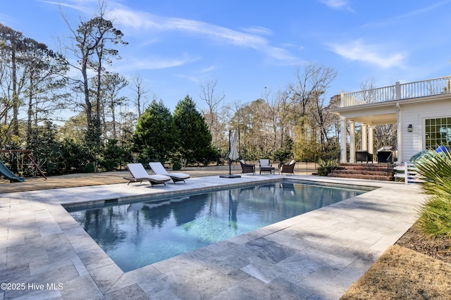 view of pool with a patio area