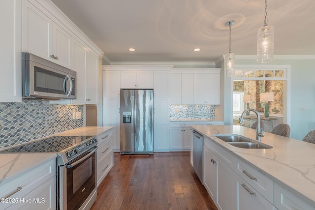 kitchen featuring white cabinetry, stainless steel appliances, and sink