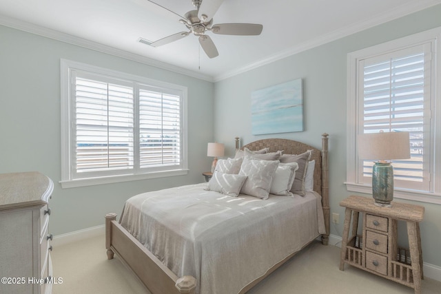 bedroom featuring ceiling fan, light colored carpet, and ornamental molding