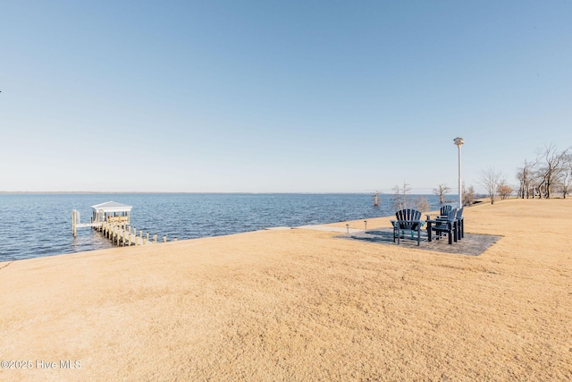 property view of water featuring a boat dock