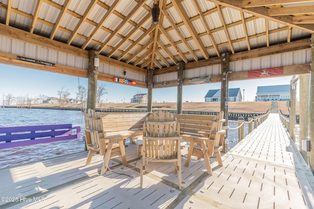 view of dock featuring a water view and a gazebo