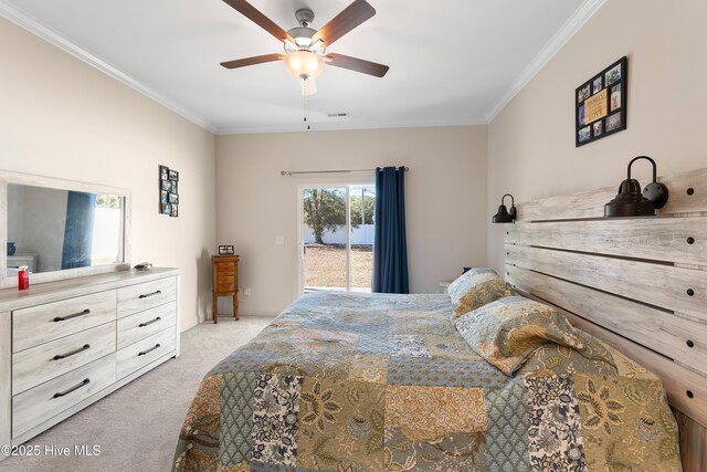 bedroom with ceiling fan, crown molding, and light carpet