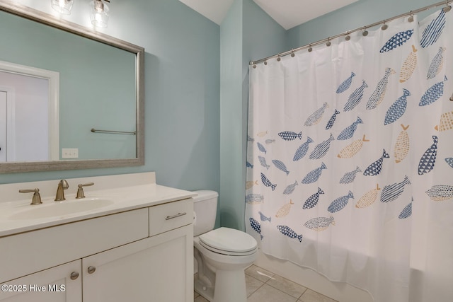 full bathroom with shower / bath combination with curtain, tile patterned floors, vanity, and toilet