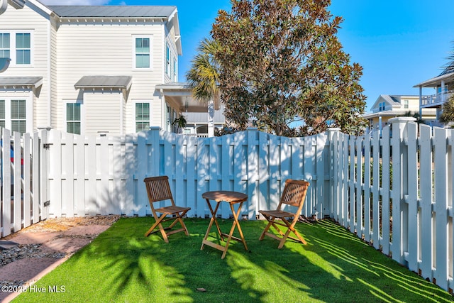 view of yard with a fenced backyard