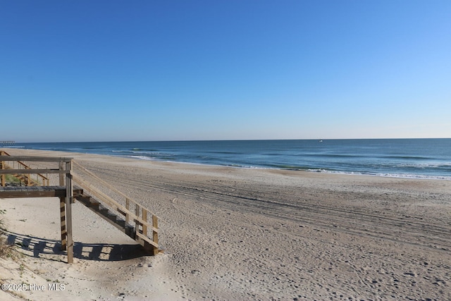 property view of water featuring a beach view