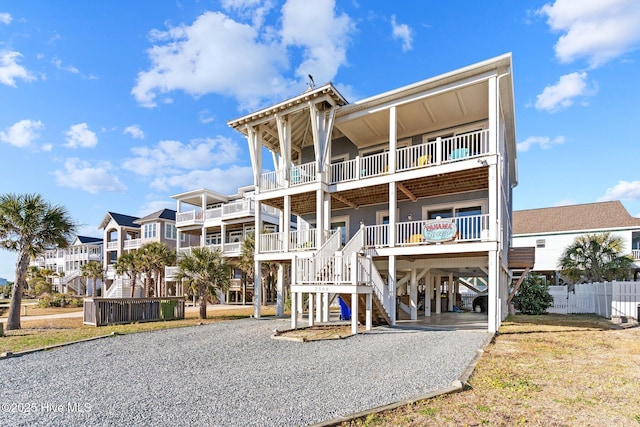 back of property featuring a carport