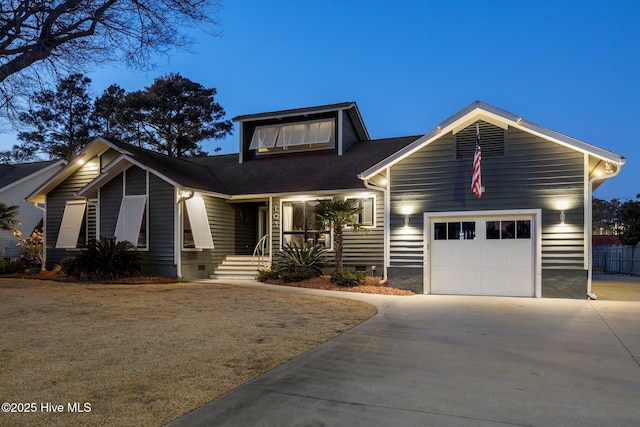 view of front of property with a garage