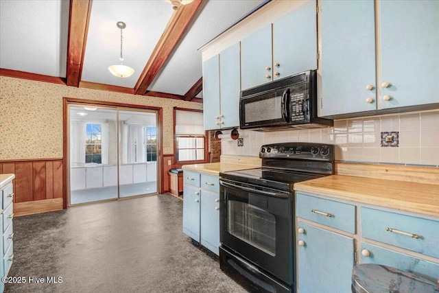 kitchen with blue cabinets, black appliances, hanging light fixtures, and vaulted ceiling with beams