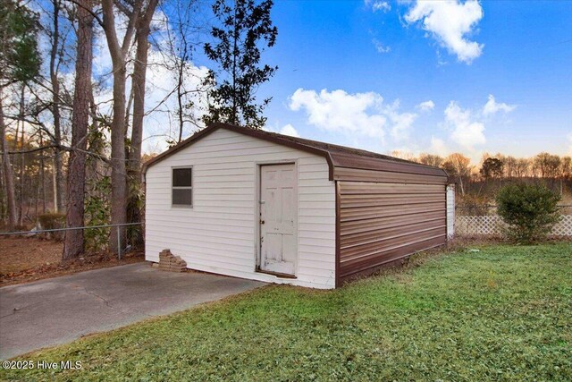 unfurnished bedroom featuring ensuite bath, ceiling fan, light hardwood / wood-style floors, and multiple closets