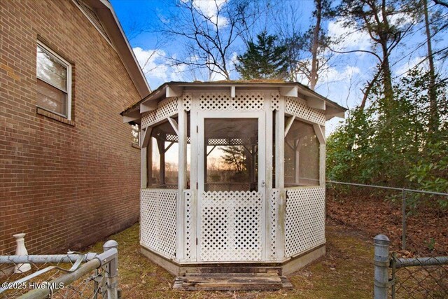 view of outdoor structure with a lawn