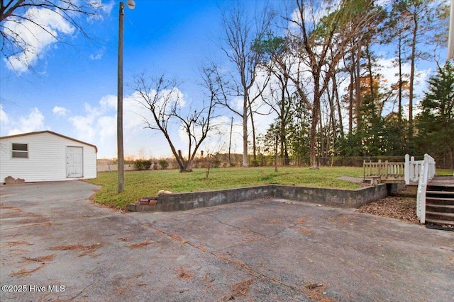 view of patio featuring a storage unit