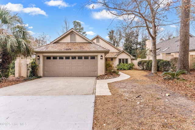 single story home featuring a garage