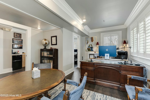 office space featuring dark hardwood / wood-style floors and crown molding