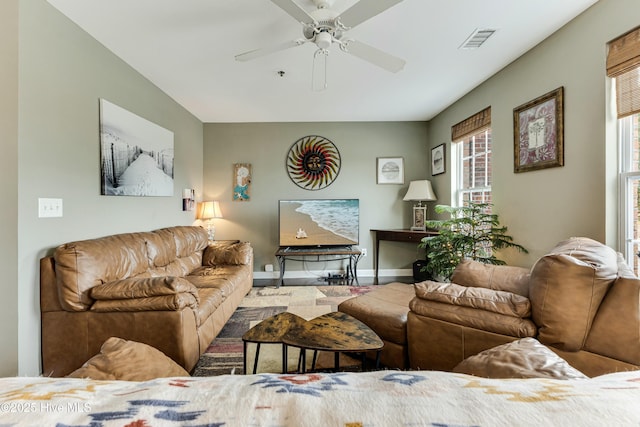 living room with ceiling fan