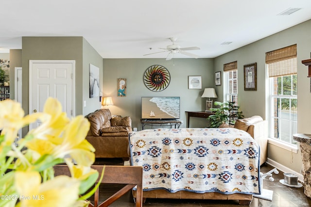 interior space featuring ceiling fan