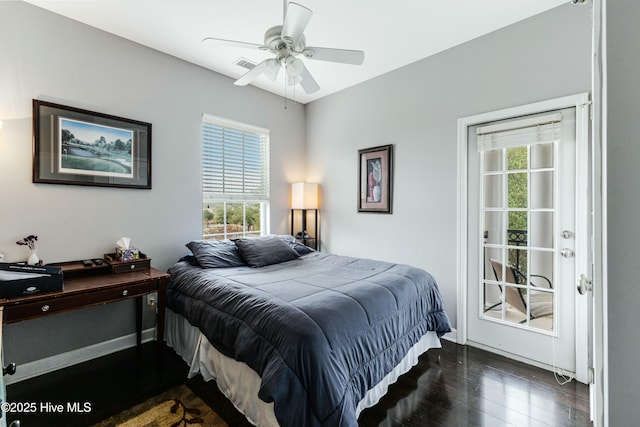 bedroom with ceiling fan and dark hardwood / wood-style floors