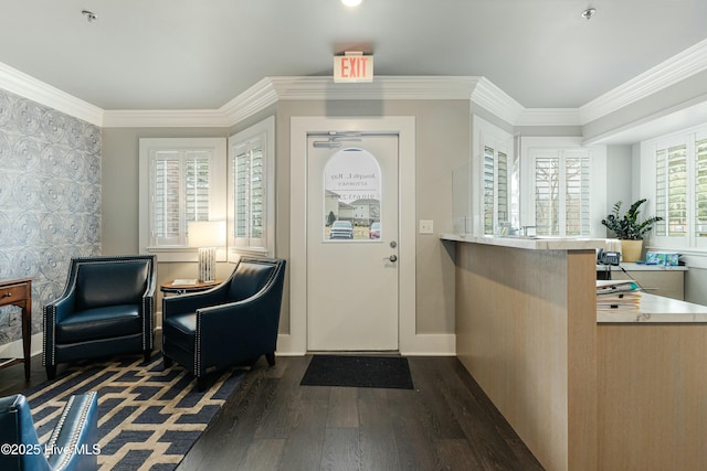 entryway with dark wood-type flooring, a wealth of natural light, and ornamental molding