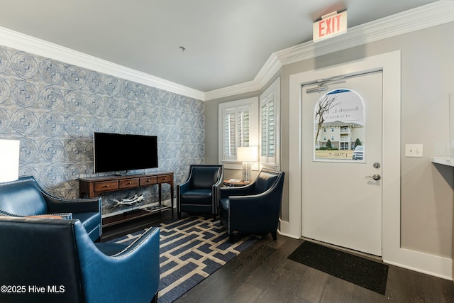 foyer with dark hardwood / wood-style flooring and ornamental molding