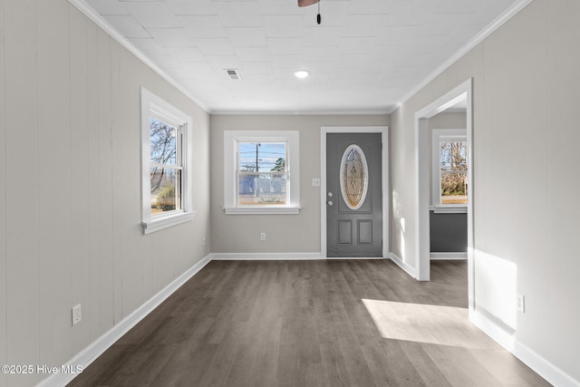 entryway with crown molding and wood-type flooring