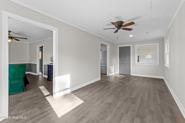 unfurnished room with ceiling fan, crown molding, and dark hardwood / wood-style floors