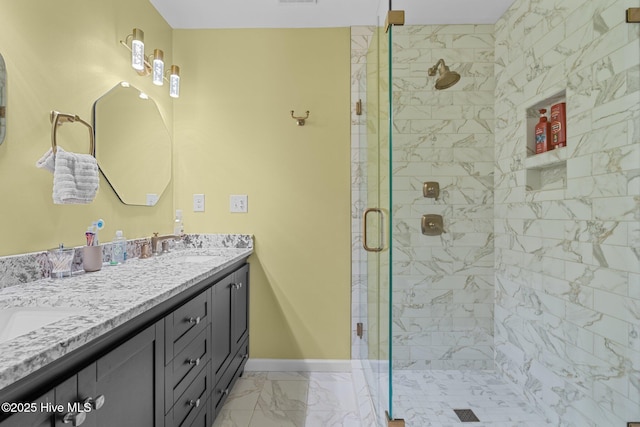 bathroom with vanity and an enclosed shower