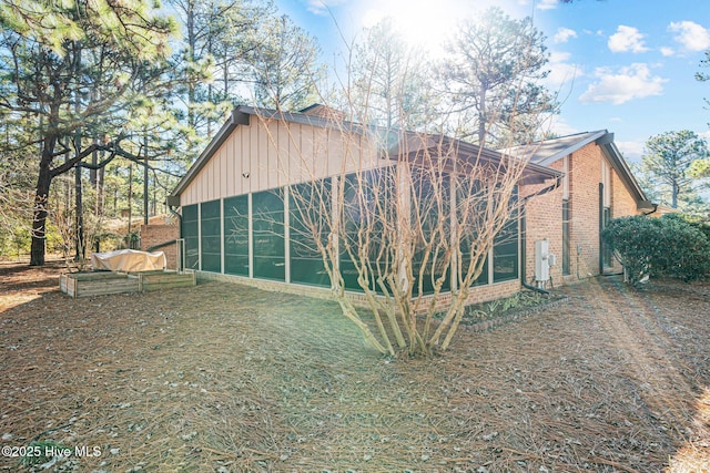 exterior space with a sunroom