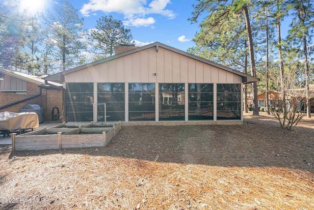 exterior space with a sunroom