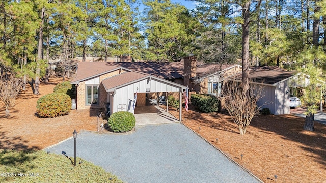 view of front of home featuring a carport