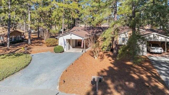 view of front facade with a carport