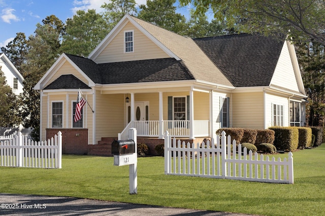 view of front of property featuring a front yard and a porch