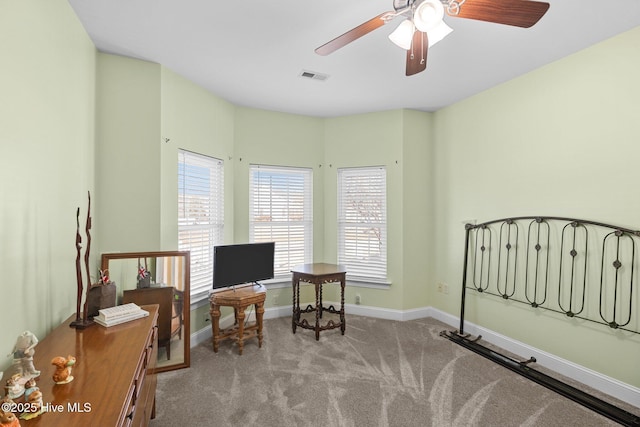 bedroom featuring ceiling fan and light colored carpet