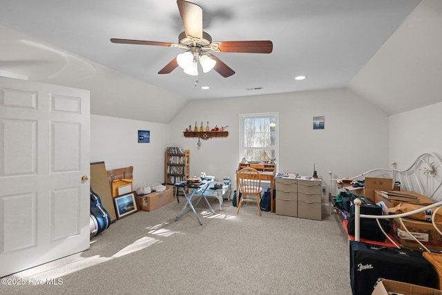 interior space with ceiling fan, carpet, and lofted ceiling